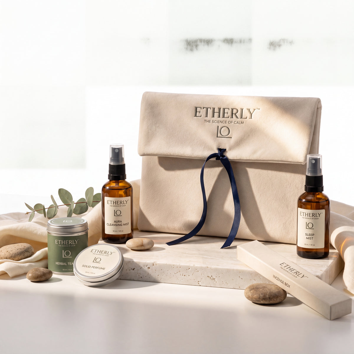 Etherly build-your-own gift kit with a velvet pouch, amber mist bottles, and ritual accessories